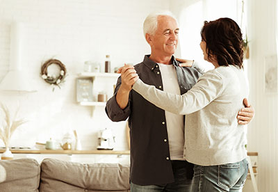 Elderly Happy Couple Dancing